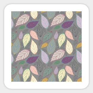 Assorted beautiful colorful leaves on warm grey Sticker